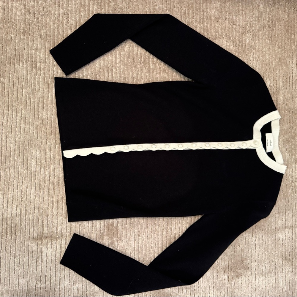 Aritizia Black Sweater with White Accents. Like New without tags. Size small.